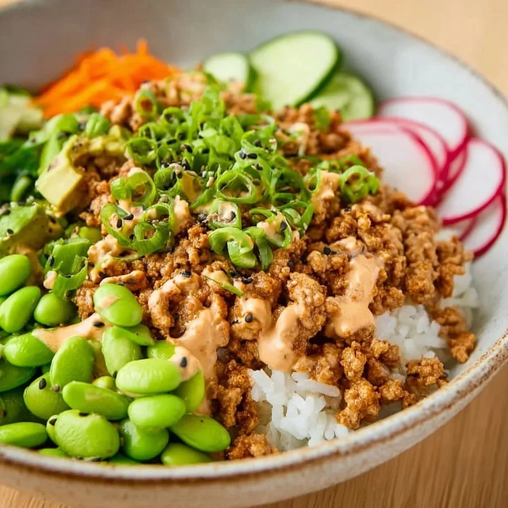 Easy ground turkey rice bowls with spicy bang bang sauce served in a bowl
